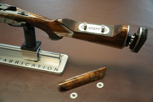 Adjustable gun comb assembly.